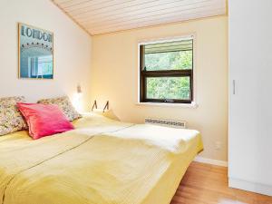 Voodi või voodid majutusasutuse Holiday home Jerup XLVII toas