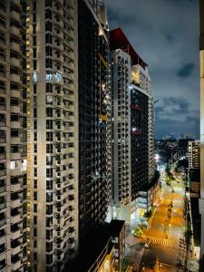 Nespecifikovaný výhled na destinaci Manila nebo výhled na město při pohledu z bed and breakfast