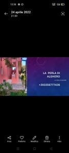 La Perla di Alghero في ألغيرو: صورة شاشة لموقع به صورة لمبنى
