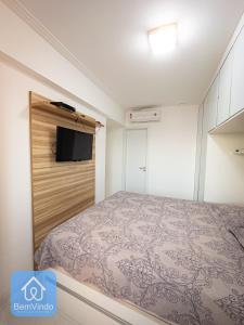 Postel nebo postele na pokoji v ubytování Apartamento Completo e Aconchegante com Vista Mar