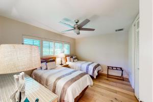 Katil atau katil-katil dalam bilik di Singer Island Serenity