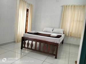 Guestland Homestay客房内的一张或多张床位