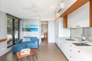 Η κουζίνα ή μικρή κουζίνα στο Reflections Byron Bay - Holiday Park