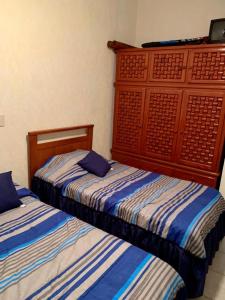 Cama o camas de una habitación en Casa Ixtapa