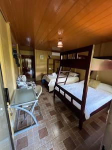 Voodi või voodid majutusasutuse Tortuguero Hill Rooms toas
