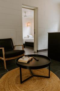Postel nebo postele na pokoji v ubytování Yeppoon Surfside Motel
