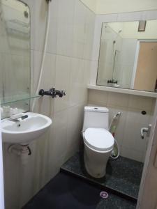 Ένα μπάνιο στο Riki Guesthouse Syari'ah
