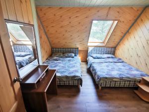 Llit o llits en una habitació de Minavuonė