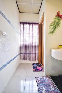 Koupelna v ubytování Xi Cun Homestay