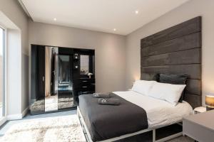Katil atau katil-katil dalam bilik di Built for Working Guests - Long Stays Welcome - Apartment 7 +32 gambar