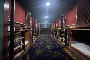 Postelja oz. postelje v sobi nastanitve Attic Capsule Hotel