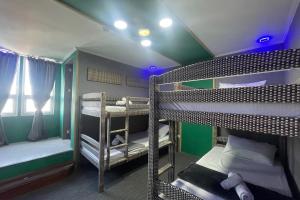 Postelja oz. postelje v sobi nastanitve Attic Capsule Hotel