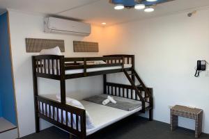 Postelja oz. postelje v sobi nastanitve Attic Capsule Hotel