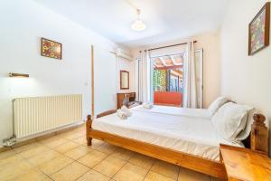 Postel nebo postele na pokoji v ubytování Arianna apartment 17