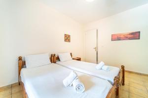 Postel nebo postele na pokoji v ubytování Arianna apartment 17