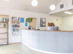 a bar in a room with a counter at NRMA Echuca Holiday Park in Echuca