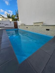 Bazén v ubytování Villa La Preneuse nebo v jeho okolí