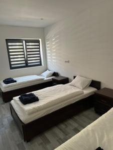 Tempat tidur dalam kamar di Guesthouse