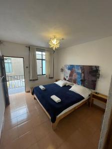 Postel nebo postele na pokoji v ubytování La Catrina Hostel