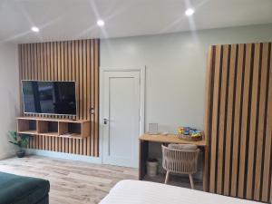 TV a/nebo společenská místnost v ubytování Sea View Studio + 8 fotografií
