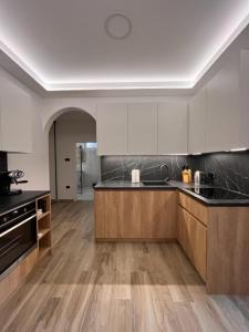 Kuchyň nebo kuchyňský kout v ubytování APARTMA NIKA
