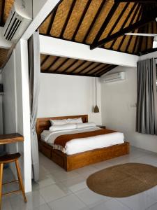 Ένα ή περισσότερα κρεβάτια σε δωμάτιο στο Sol Studios Pererenan