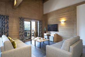 Posezení v ubytování MGM Hôtels & Résidences - Hôtel Alpen Lodge