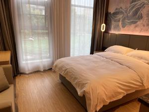 Fotografie z fotogalerie ubytování GreenTree Eastern Hotel Jiangsu Wanda Plaza Ocean University Huangguoshan v Lien-jün-kangu