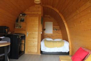 Postel nebo postele na pokoji v ubytování Bungalow Casa da Cerca