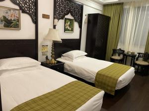 Fotografie z fotogalerie ubytování GreenTree Eastern Hotel Tianjin Wuqing Wanda Plaza v destinaci Wuqing + 26 fotografií