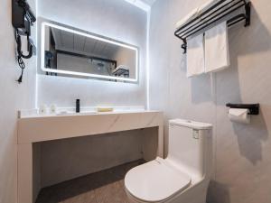Koupelna v ubytování GreenTree Inn Express Hotel Suzhou Taicang West Nanjing Road + 12 fotografií