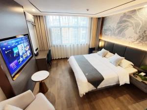 TV a/nebo společenská místnost v ubytování GreenTree Eastern Hotel Huai'an University