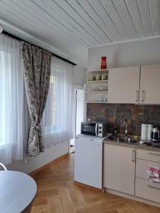 ザラサイにあるVasarnamis Zarasuose - Vyšniaのギャラリーの写真 +7枚の写真