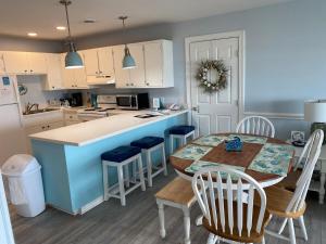 Η κουζίνα ή μικρή κουζίνα στο Turtley Paradise West home