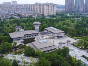 an overhead view of a building in a city at GreenTree Eastern Hotel Xuzhou Pei County Binhe Road in Pei