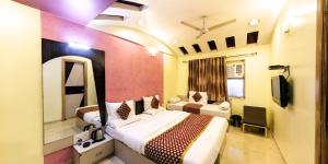 Hotel Vishram客房内的一张或多张床位