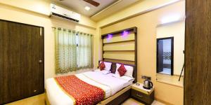 Hotel Vishram客房内的一张或多张床位