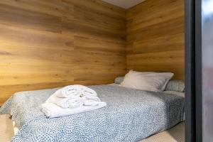 Postel nebo postele na pokoji v ubytování HOMEABOUT MADRID RÍO APARTMENT