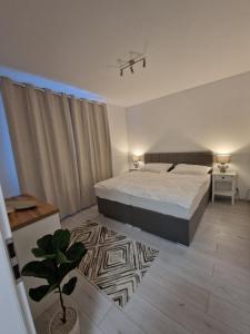 Posteľ alebo postele v izbe v ubytovaní Maja apartman