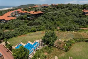 an aerial view of a house with a swimming pool at 602 Zimbali Suites, Ocean View in Ballito