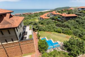 an aerial view of a house and the ocean at 602 Zimbali Suites, Ocean View in Ballito