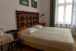 Posteľ alebo postele v izbe v ubytovaní Kolory Guest House