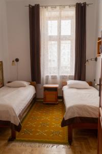 Posteľ alebo postele v izbe v ubytovaní Kolory Guest House
