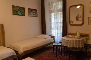 Posteľ alebo postele v izbe v ubytovaní Kolory Guest House
