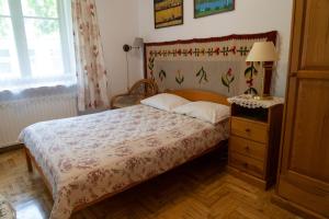Posteľ alebo postele v izbe v ubytovaní Kolory Guest House