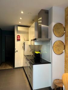 Una cocina o zona de cocina en Musea Hotel & Apartments