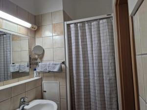Kúpeľňa v ubytovaní Ta'karos apartman + 4 fotografie