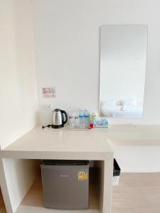 Kuchyň nebo kuchyňský kout v ubytování Tanatnan Hotel