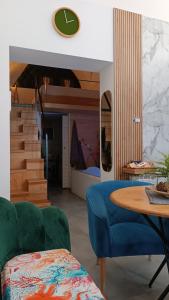 A seating area at Cammileddi mini suite