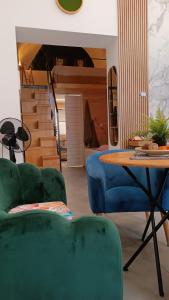 A seating area at Cammileddi mini suite